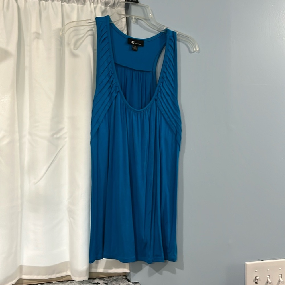 Blue tank ruffled at top